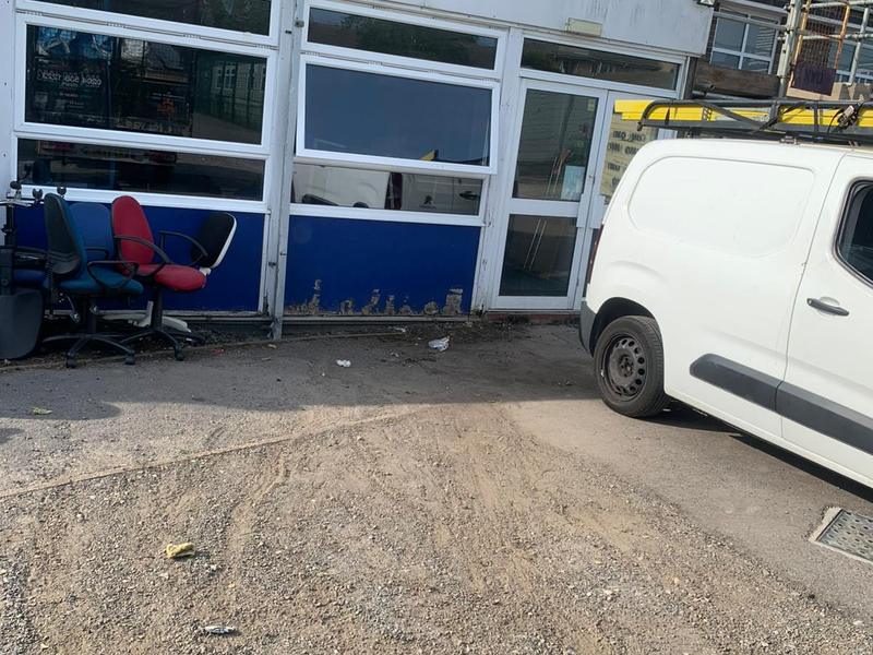 The same commercial building frontage after the bulk bags were removed